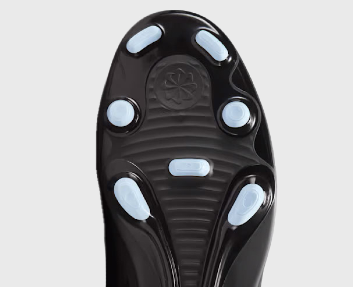 Multi Ground outsole viewed from below — smaller rounded studs spread across the sole for versatile grip